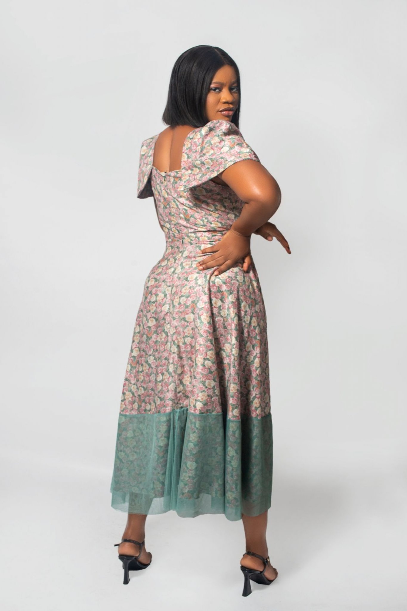  The fit and flare midi dress with cape sleeves